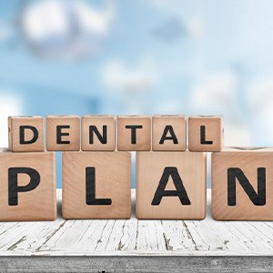Blocks spell “dental plan”