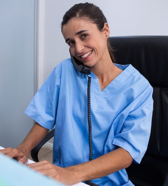 Dental team member answering the phone