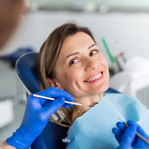 Smiling woman attending dental checkup