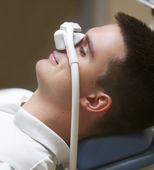 Dental patient during nitrous oxide sedation dentistry appointment