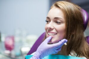 Young woman in the dentist's chair.